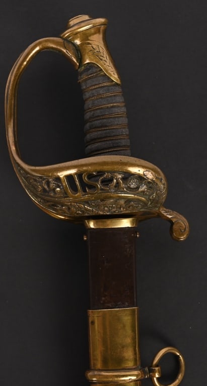 CIVIL WAR STAFF & FIELD OFFICERS SWORD BY CLAWBERG: Slightly curved imported steel blade with ricasso is marked with "Clauberg Solingen" with logo. Right side of blade with etched 3/4 panel featuring arms motifs and an eagle "Federal Eagle. The other s
