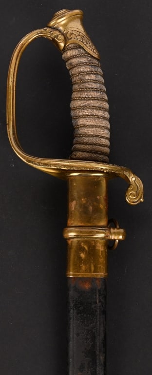 CIVIL WAR M1850 MARINE CORPS OFFICERS SWORD USMC: A super rare, M1850 Marine Corps Officers Sword by WKC in excellent condition. 38” o/a with 32 ½” brilliantly and profusely etched blade with martial motifs including a fine “EA