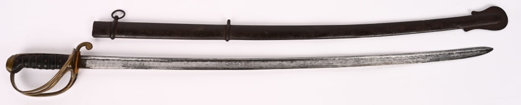 1838 DATED AMES MODEL 1833 DRAGOON SABER OR SWORD: Very Good Condition An early and significant example of the Model 1833 Dragoon Saber, manufactured by the N. P. Ames Company of Springfield, Massachusetts, and dated 1838—making it one of the ea