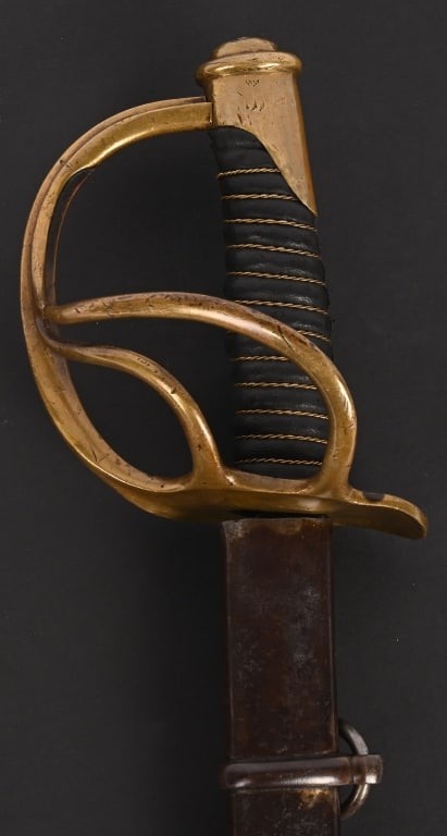 CIVIL WAR 1862 DTD CAVALRY SWORD by D. J. MILLARD: Produced under the smallest government contract for sabers (10,000) by the D. J. Millard Company’s manufacturing center in Clayville, New York, this early production weapon is a M-1860 Light Cav