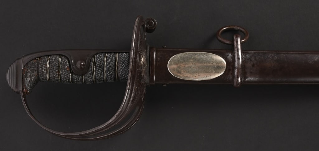 CIVIL WAR NON REGULATION OFFICER SWORD CLAUBERG: A fine Presentation non-regulation Civil War officer’s sword US Model 1850 c. 1861. Made by Clauberg Solingen. The ricasso is marked “W. Clauberg Solingen” and “Iron Proof̶