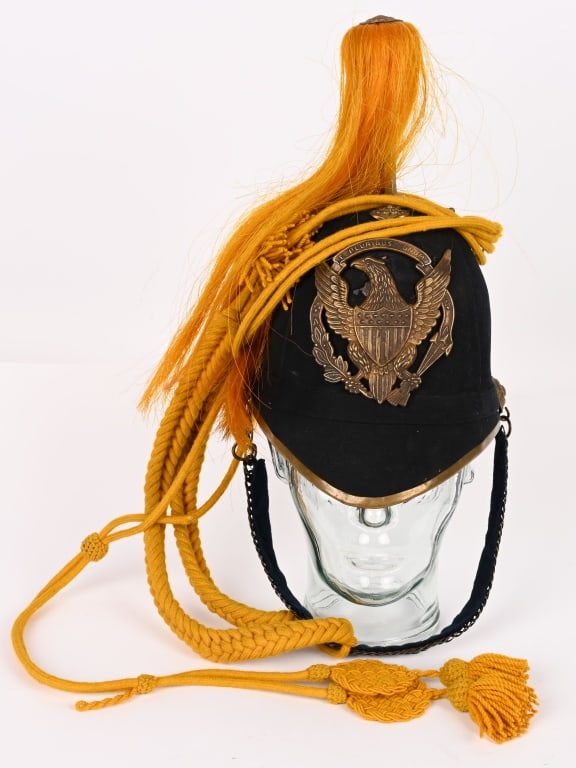US INDIAN WAR ARMY CAVALRY PLUMED HELMET SHAKO: Shako has a black cloth body w/ a brass eagle on the front. Has an orange/yellow horse hair plumb with tassels. The inside has a black leather liner. Excellent for display. Rare.
