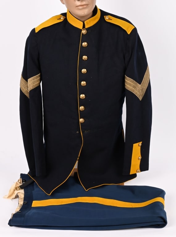 US INDIAN WARS CAVALRY SERGEANT UNIFORM M1881: Model 1881 Dress Coat With Trousers: The Model 1881 NCO's Cavalry Full Dress Coat is made of dark blue wool, with nine buttons sewn in a single column. The shoulder straps, collar and tail flaps are