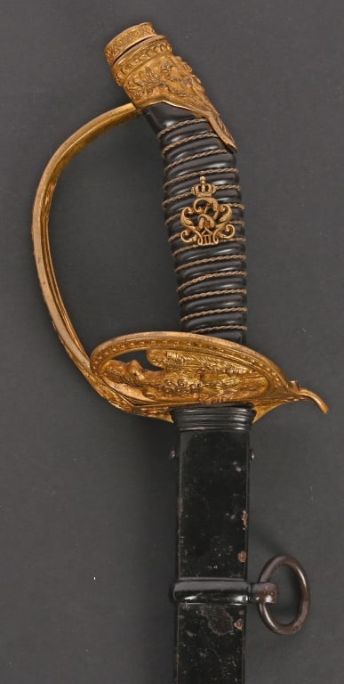 WWI IMPERIAL GERMAN DAMASCUS M1889 PRUSSIAN SWORD: WWI Imperial German Prussian M1889 Degen Infantry sword with Damascus Blade measuring 32 1/2 inches overall with a 26 3/4 inch double fullered straight damascus blade that is maker marked by Rudolf