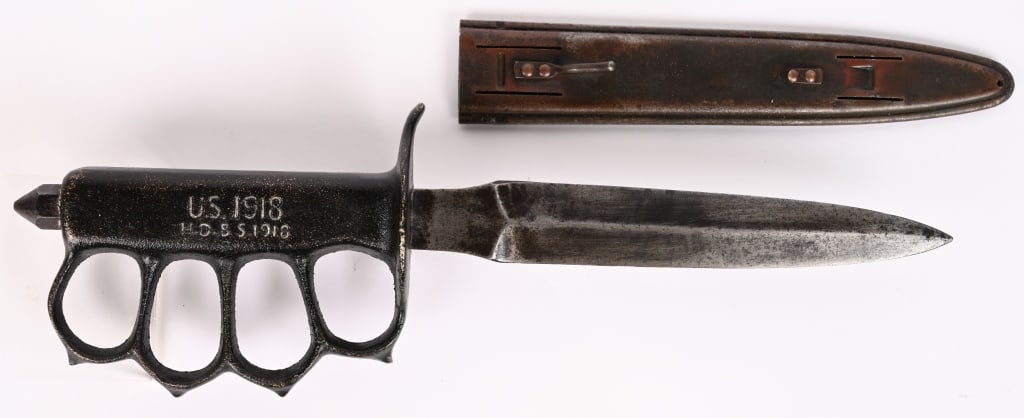 WWI US M1918 TRENCH KNIFE H.D & S. W/ SCABBARD: Model 1918 "Knuckle Duster" Trench knife with solid brass handle made by Henry Disston & Sons and so marked "H. D. & S." on the handle and on the scabbard is marked L.F. & C. 1918 missing one