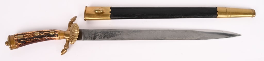 WW1 IMPERIAL GERMAN HUNTING CUTLASS WWI: This hunting hirschfanger is a very nice and high quality example. The mounts are all composed of a toned brass base. The pommel cap has the usual umbrella-like flare outs and it is topped with a