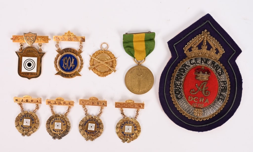 SOLID GOLD DISTINGUISHED MARKSMANSHIP MEDAL LOT: Lot of Gold US Distinguished Marksmanship medals with a scrap amount of $9210.00 to the same man to include 1) 14 Karat medal weighing 28.20 grams. Named to the reverse K.K.V. Casey 1st. Lieut.