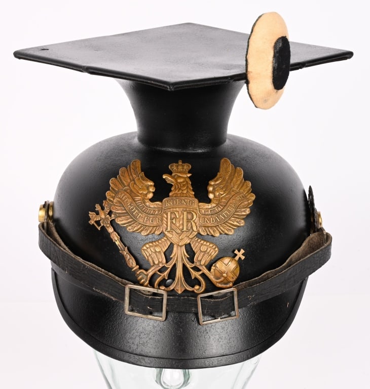 WWI M1915 IMPERIAL GERMAN EM UHLAN TSCHAPKA WW1: Prussian Line Prussian Uhlan Enlisted Man Tschapka Model 1915. Black repainted metal body, round front visor and mortar board. Exterior is excellent and still has nice sheen. Interior has a pre-war st