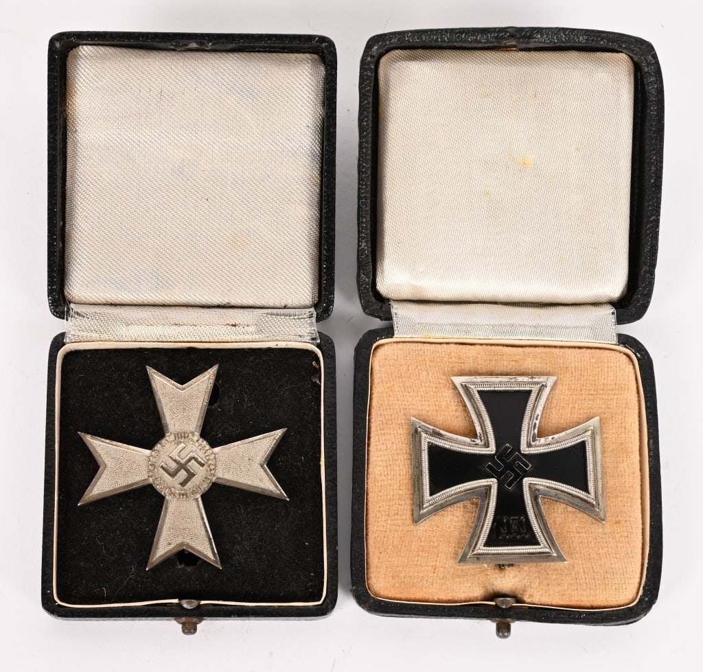 WWII NAZI GERMAN IRON CROSS WAR MERIT CROSS MEDAL: Lot of WWII Nazi German medals to include 1) CASED IRON CROSS 1ST CLASS, 1939 "L/50". 1939 pattern, die struck, three piece, iron and alloy construction Patté style cross with a single 