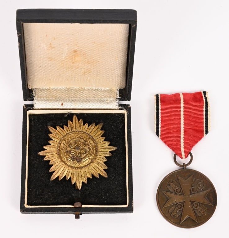 WWII NAZI GERMAN EAGLE ORDER EASTERN PEOPLES MEDAL: Lot of two medals to include 1) WWII NAZI CASED EASTERN PEOPLE MEDAL 1ST CLASS. Die struck, zinc alloy construction award with a gilt wash is in the form of a thirty-two point, sunburst star