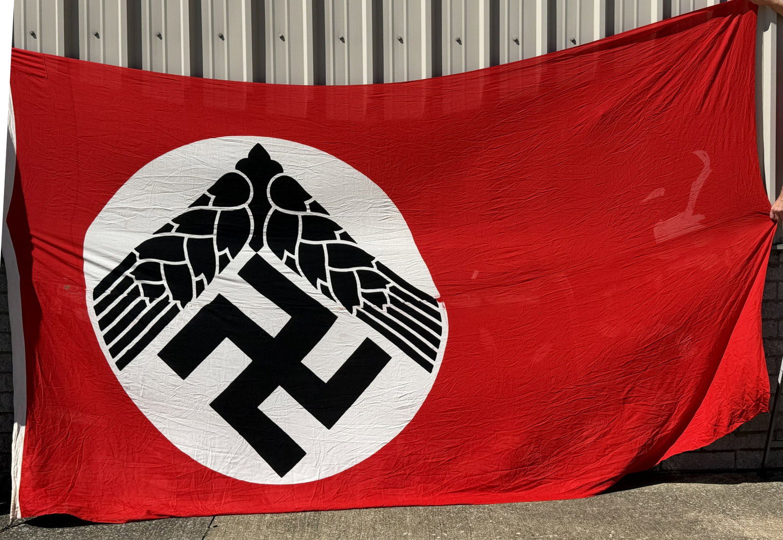 WWII NAZI GERMAN RAD FLAG REICHSARBEITSDIENST WW2: A double sided, printed, red flag measuring approximately 8 X 15 Feet. The flag is unmarked and is in very good condition. Original bunting rope is present. Excellent. The Reich Labor Service (Reichsa