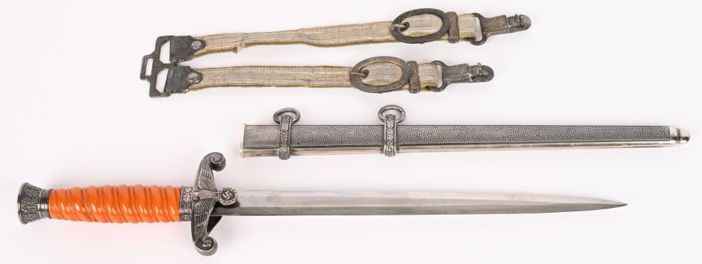 WWII NAZI GERMAN ARMY OFFICER DAGGER BY SPITZER: The dagger features a drop forged steel, nickel/silver plated, stiletto style blade with a flat central ridge. The blade is overall near MINT. The reverse ricasso is well marked with deeply acid etche