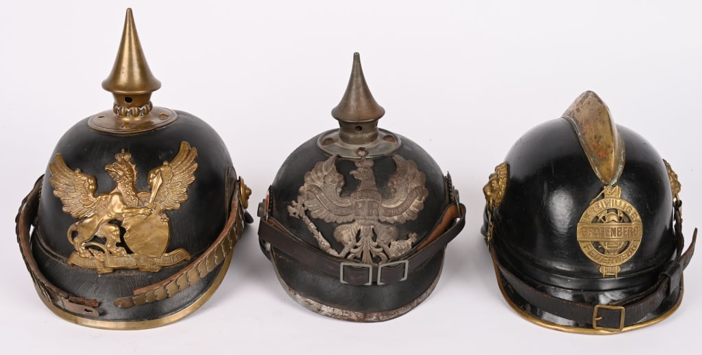 WW1 IMPERIAL GERMAN SPIKED HELMET LOT BADEN WWI: Lot of Imperial German Spiked Helmets to include 1) WW1 IMPERIAL GERMAN M1915 PRUSSIAN SPIKED HELMET WWI. Steel fittings with a replaced Prussian Cockade but original. Leather liner show significant