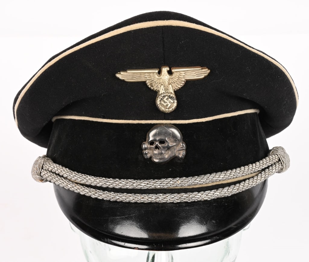 WWII NAZI GERMAN ALLGEMEINE SS OFFICERS VISOR HAT: Nice quality, black wool construction visor cap. The centerband is also constructed in the same black velvet. The cap has white wool waffenfarbe to the top crown edge and both the top and bottom edges