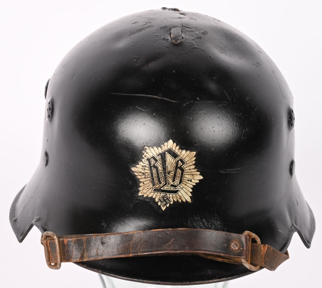 WWII NAZI GERMAN LUFTSCHUTZ RLB HELMET W LINER WW2: The stamped sheet steel construction civic M34 "square dip" style helmet retains most of its original black satin finish paint. The front of the helmet has the RLB logo decal. The helmet has two separ