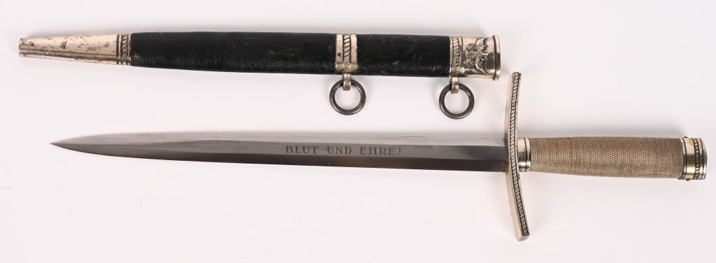 WWII GERMAN M1937 HITLER YOUTH LEADER DAGGER WW2: WWII German M1937 Hitler Youth Leader Dagger. Double edged, bright blade. Acid etched motto "Blut Und Ehre!" on one side of the blade, RZM M7/36 on the reverse. Nickel-silver crossguard with twisted s