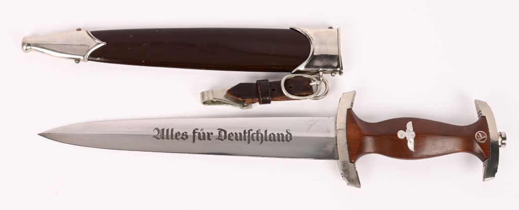 WWII NAZI GERMAN SA M33 DAGGER BY M/7/66 WW2: Roughly, 22cm long, double edged, nickel/silver plated, drop forged steel construction blade with a low central ridge. The blade shows minimal to no wear including running marks. The obverse of the bl