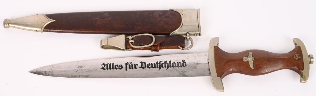 WWII NAZI GERMAN M33 SA DAGGER W/ LEATHER HANGER: Early nice quality dagger features a roughly 8 3/4" (22.2 cm) long double edged nickel/silver plated drop forged steel construction blade with a low central ridge and a full length including the hilt 