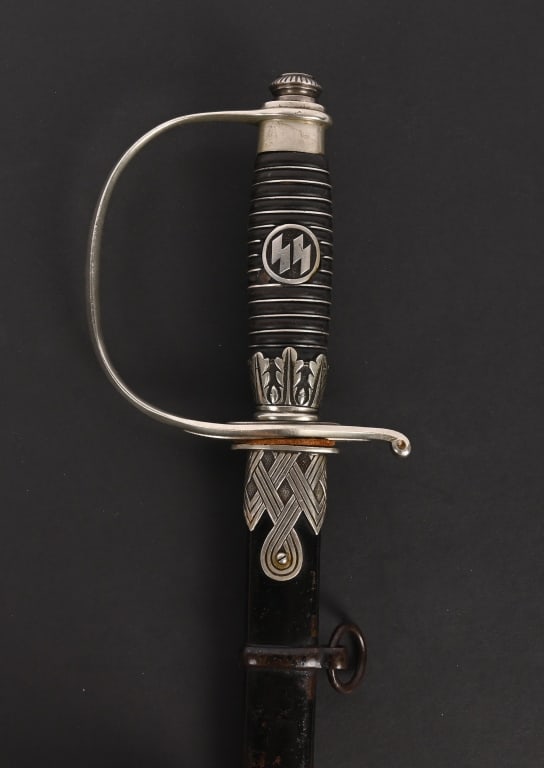 WWII NAZI GERMAN SS OFFICERS SWORD BY KREBS WW2: The hilt of this example is nickel-plated. The upper area has the built-in step area that accommodates the tang/pommel cap. The pommel is a fine example having crisp serration and has not ever been ap