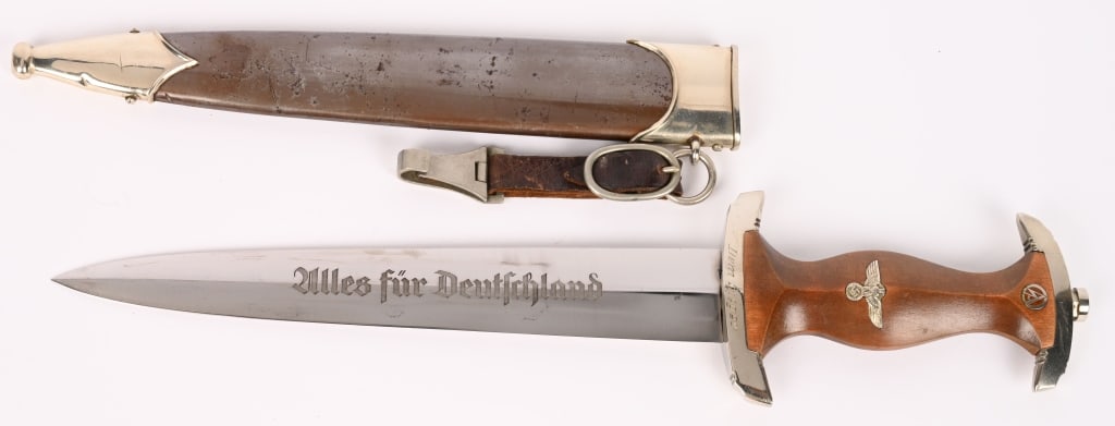 WWII NAZI GERMAN SA M33 DAGGER ENGRAVED NAMED WW2: Early, (Circa 1933-1934), nice quality dagger features a roughly, 8 3/4", (22.3 cm), long, double edged, nickel/silver plated, drop forged steel construction blade with a low central ridge and a full 