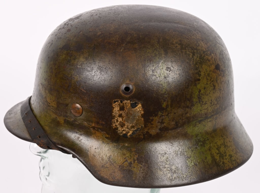 WWII NAZI GERMAN KRIEGSMARINE CAMO HELMET SE64 WW2: The stamped, sheet steel construction helmet retains about 70% of its three color camo paint. The left side of the helmet has a Wehrmacht eagle shield decal featuring a deep, golden yellow eagle with 