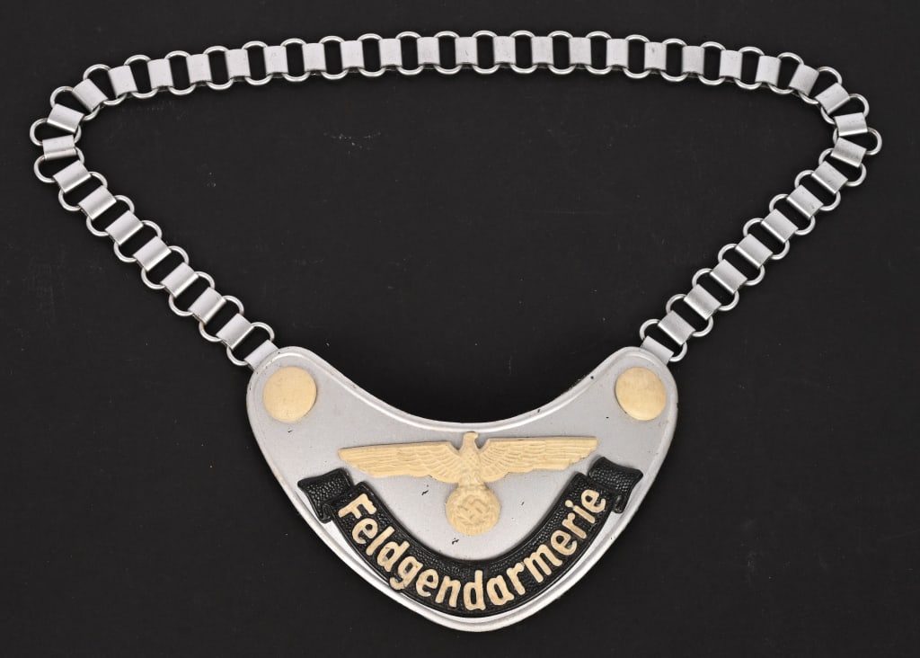 WWII NAZI GERMAN FELDGENDARMERIE POLICE GORGET WW2: Multi-piece construction both the gorget and the chain are made entirely of die-stamped steel magnetic aluminum-coated spread-winged Army eagle and both buttons are painted in a white radium paint gra