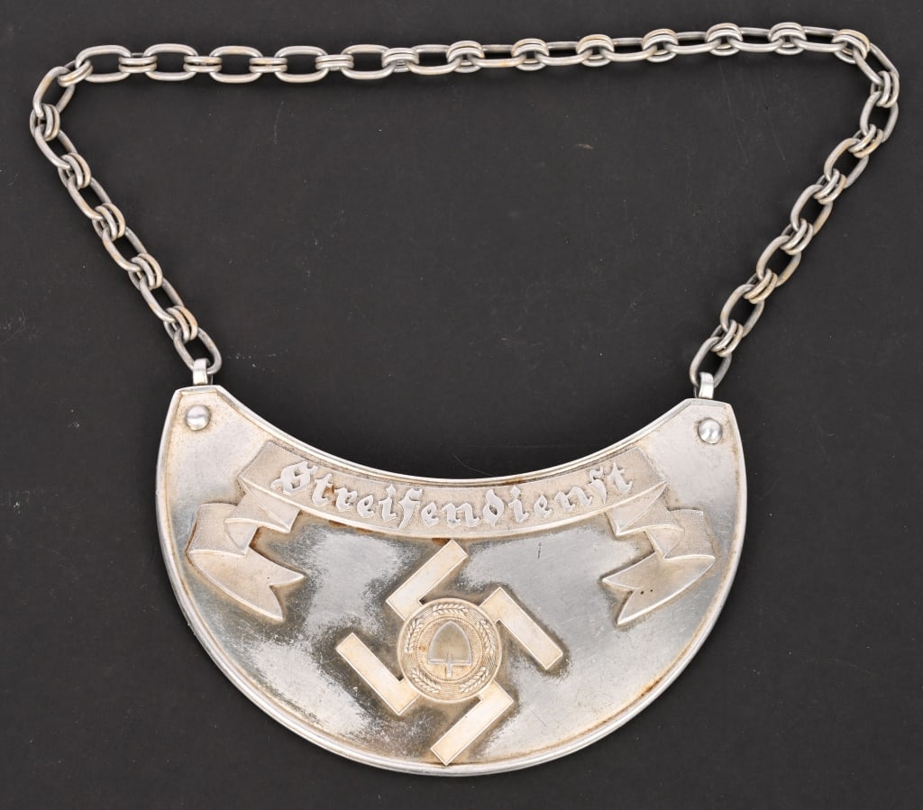 WWII NAZI GERMAN RAD PATROL DUTY GORGET W CHAIN: Gorgets hold an interesting place in history, as they are a throw-back to the days of medieval knights, when suits of armor included a neck protection device called a Gorget. They have been used since