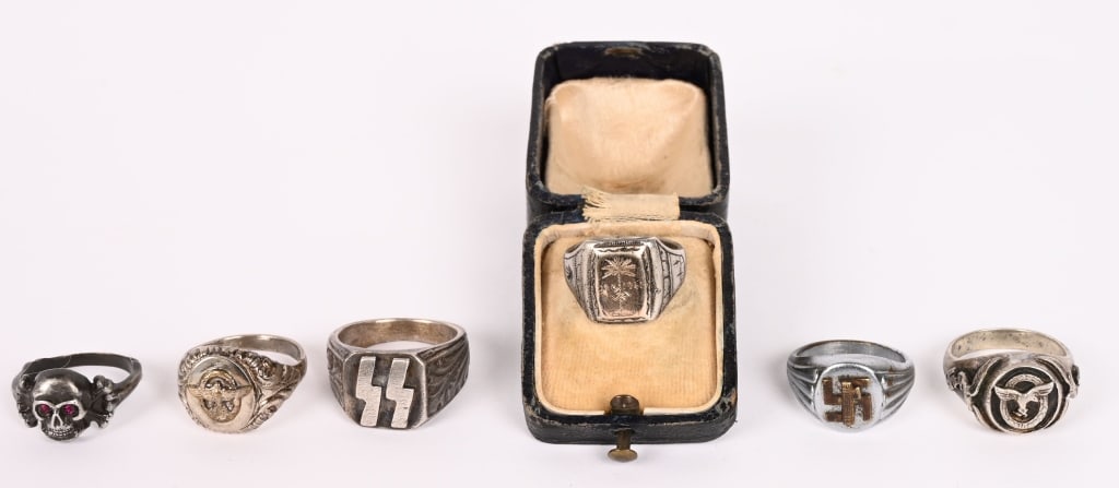 WWII NAZI GERMAN MENS RING LOT SS POLICE FASCIST: Lot of WWII Nazi German Rings to include 1) WWII NAZI GERMAN DAK AFRIKA KORPS RING 1941 WW2. WWII German DAK ring dated 1941 and to the center is the DAK insignia. Roughly a size 6. Excellent.2) SKULL