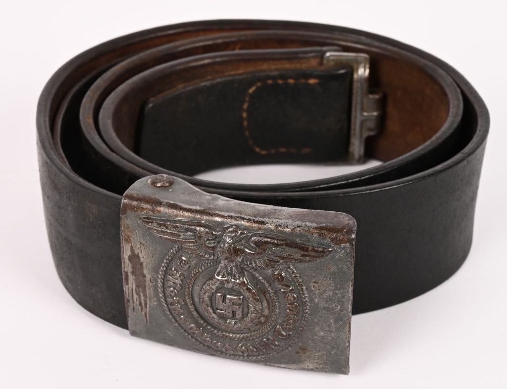WWII NAZI GERMAN WAFFEN SS BELT & BUCKLE WW2: This Steel SS Buckle is an original piece that shows signs of having been used. It’s made of painted steel. The high points of the design show wear. On the reverse, some original paint remains, 