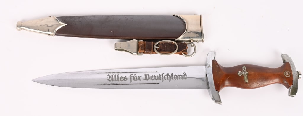 WWII NAZI GERMAN SA DAGGER BY SMF WW2: This SMF SA Dagger is a very nice example with a nickel silver tang nut and guards. The grip remains in excellent condition and nicely fits the crossguards. The SA runes button retains perfect enamel.