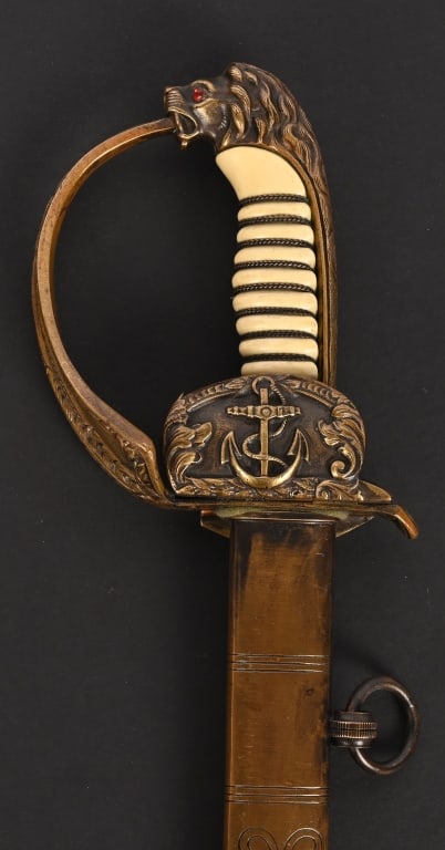 WWII NAZI GERMAN KRIEGSMARINE OFFICERS SWORD WW2: The sword has an overall length in the scabbard of approximately 37 inches with a blade length of 31 inches. The blade is still very bright. The ricasso bears the manufacturing mark of the E&F Horster
