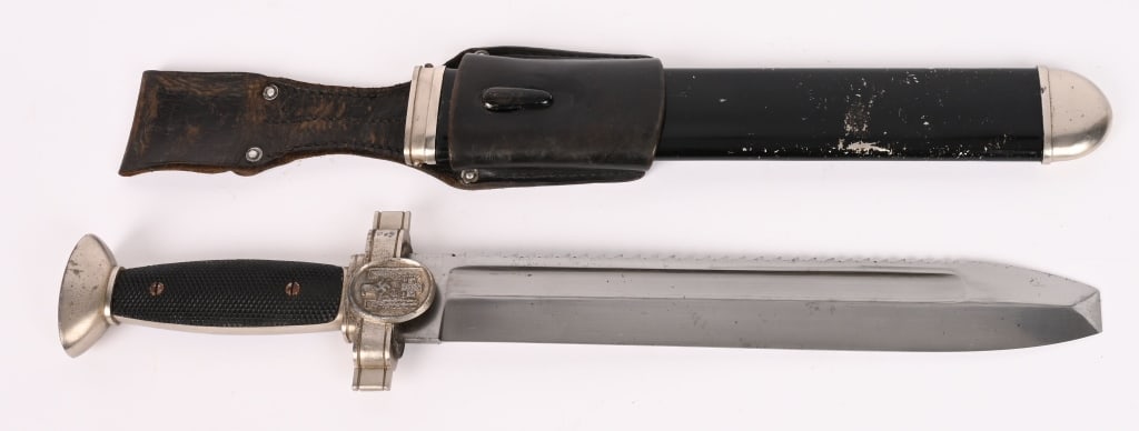 WWII NAZI GERMAN RED CROSS HEWER EM DAGGER WW2: Model 1938 Deutsches Rotes Kreuz (German Red Cross) Hewer. The blade is untouched and in excellent condition. The sharp teeth to the saw back are in perfect condition. The blade is not maker marked. T