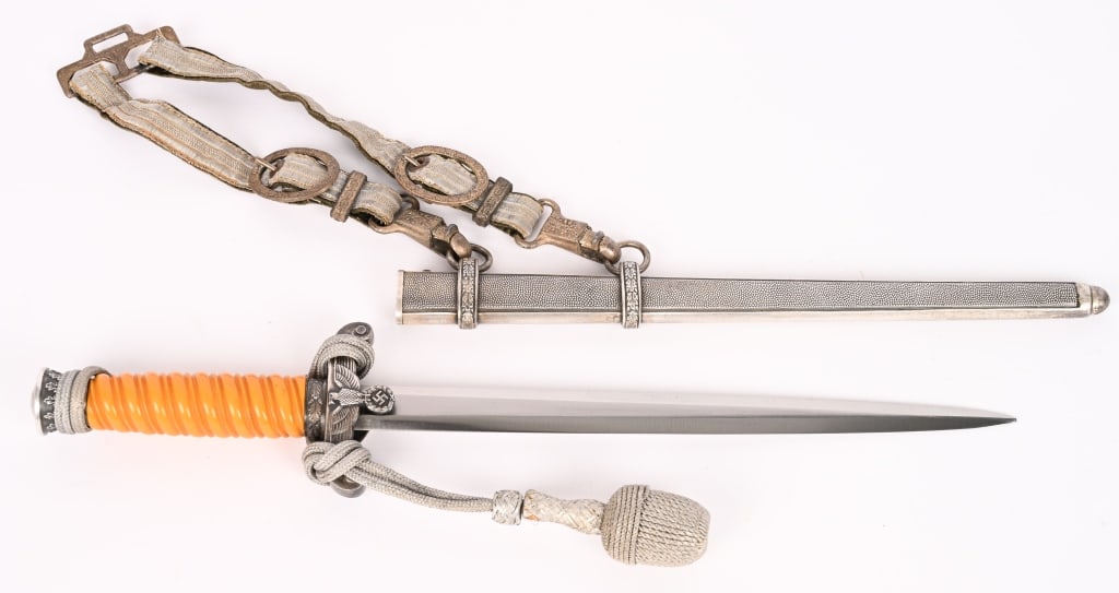 WWII NAZI GERMAN OFFICERS DAGGER PERSONALIZED WKC: The dagger features a roughly 26cm long drop forged steel construction nickel/silver plated stiletto style blade with a flat central ridge. The blade is in overall excellent condition with most of the