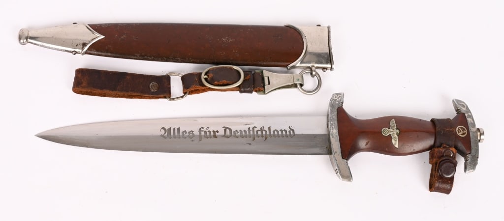 WWII NAZI GERMAN M33 SA DAGGER F.W. HOLLER M7/33: This SA Dagger is a very nice example with a nickel plated tang nut and guards. The plating remains worn throughout. The grip is a nice example being a typical RZM type with a high center ridge. It re