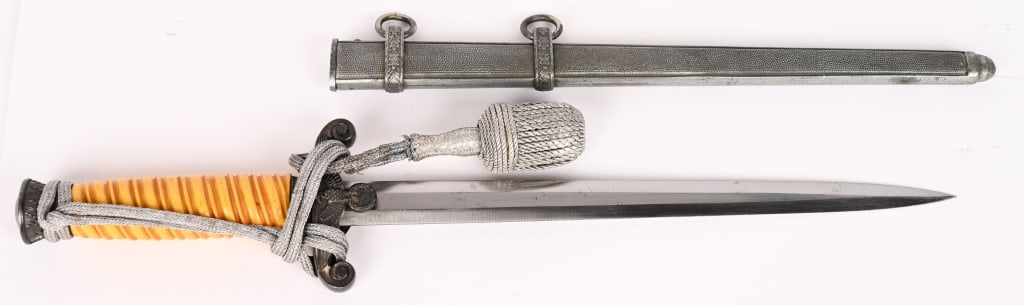 WWII NAZI GERMAN OFFICERS DAGGER BY EICKHORN WW2: The dagger features a roughly 26cm long drop forged steel construction nickel/silver plated stiletto style blade with a flat central ridge and a full length including the hilt of roughly 38cm. Nice
