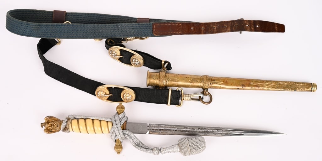 WWII NAZI GERMAN KRIEGSMARINE DAGGER BY HORSTER: Kriegsmarine Dagger by Hörster. The blade is in very good condition with crisp etchings on both sides depicting a naval motif. The etchings retain much of the original darkening, and great