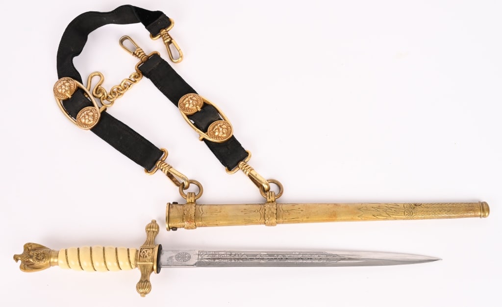 WWII NAZI GERMAN KRIEGSMARINE DAGGER BY HORSTER: Kriegsmarine Dagger by Hörster. The blade is in very good condition with crisp etchings on both sides depicting a naval motif. The etchings retain much of the original darkening, and great contra