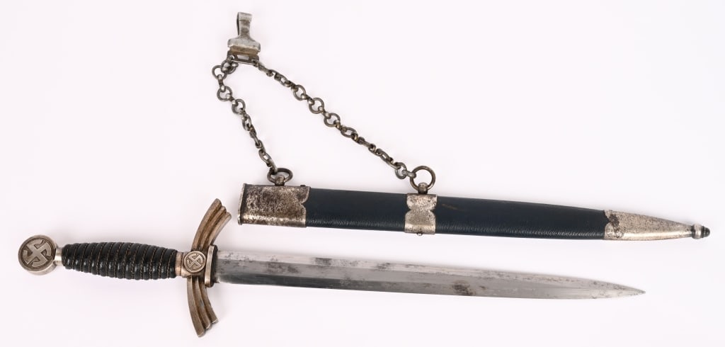 WWII NAZI GERMAN LUFTWAFFE FIRST PATTERN DAGGER: Early (circa 1936-1937) roughly 30.5cm long bright nickel/silver plated drop forged steel double edged stiletto style blade with a flat central plane that shows graying and stains. The original 