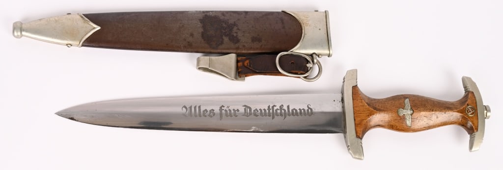 WWII NAZI GERMAN SA DAGGER BY HACO WW2: This HACO SA Dagger is a nice example with a nickel silver tang nut and guards. The grip remains in perfect condition and nicely fits the crossguards. The SA runes button retains perfect enamel. The n