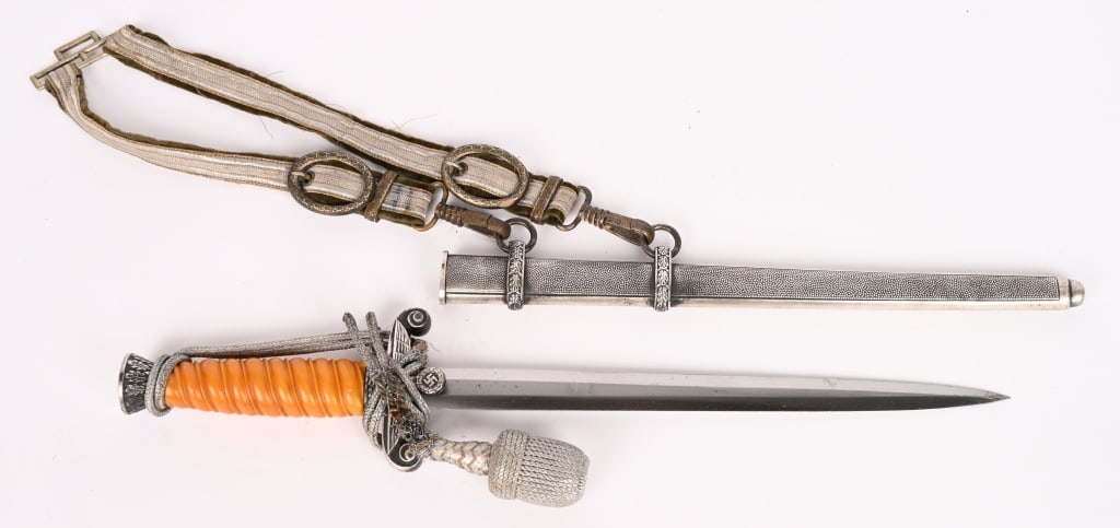 WWII NAZI GERMAN ARMY OFFICERS DAGGER BY ALCOSO: The dagger features a roughly, 26cm long drop forged steel construction nickel/silver plated stiletto style blade with a flat central ridge and a full length including the hilt of roughly 38cm. Blade 