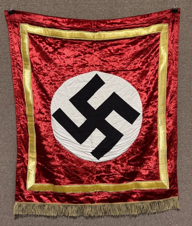 WWII NAZI GERMAN NSDAP POLITICAL PODIUM BANNER WW2: Approximately 40 X 44 inches excluding fringe is single sided multi-piece velvet / cotton construction banner features a red velvet base field with a separate white disk with a black canted Swastika .