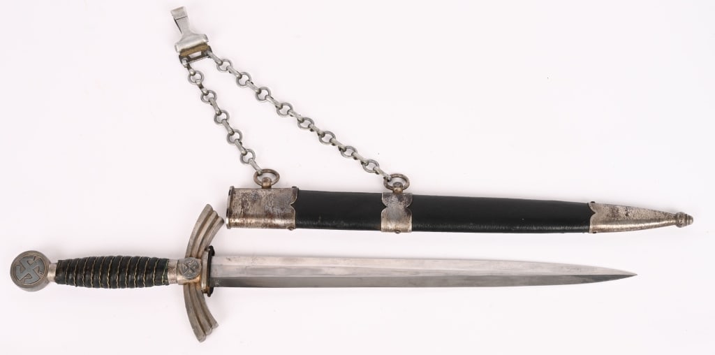 WWII NAZI GERMAN 1st MODEL LUFTWAFFE DAGGER WW2: Early (circa 1936-1937) roughly 30.5cm long bright nickel/silver plated drop forged steel double edged stiletto style blade with a flat central plane. The blade is excellent. The original pebbled, blu