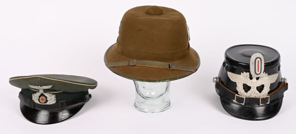 WWII NAZI POLICE SHAKO & VISOR HAT & PITH HELMET: Lot of WWII Nazi German Headgear to include 1) WWII NAZI GERMAN INFANTRY ENLISTED VISOR CAP WW2. Nice quality visor cap with a field-gray wool body and crown and a blue/green badge cloth centerband wi