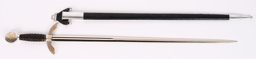 WWII NAZI GERMAN LUFTWAFFE 1st MODEL SWORD WW2: Later production, (post-1940) roughly 66cm long nickel/silver plated drop forged steel dual edged blade with a central fuller running from the cross guard about 25cm long down the blade towards the ti