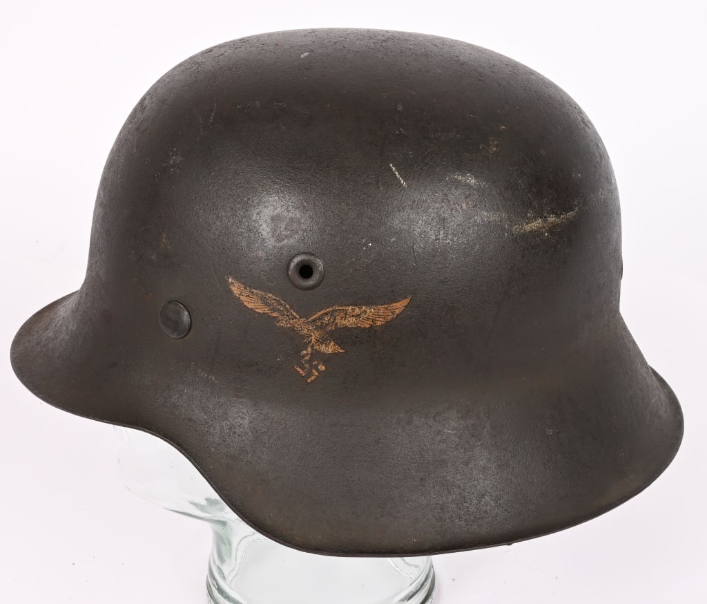 WWII NAZI GERMAN LUFTWAFFE M42 HELMET NS62 w LINER: Helmet retains about 90% of its field-gray paint. Second pattern Luftwaffe eagle decal is also retained about 90%. All three liner retaining rivets are intact. M31 tan leather liner is complete. The r