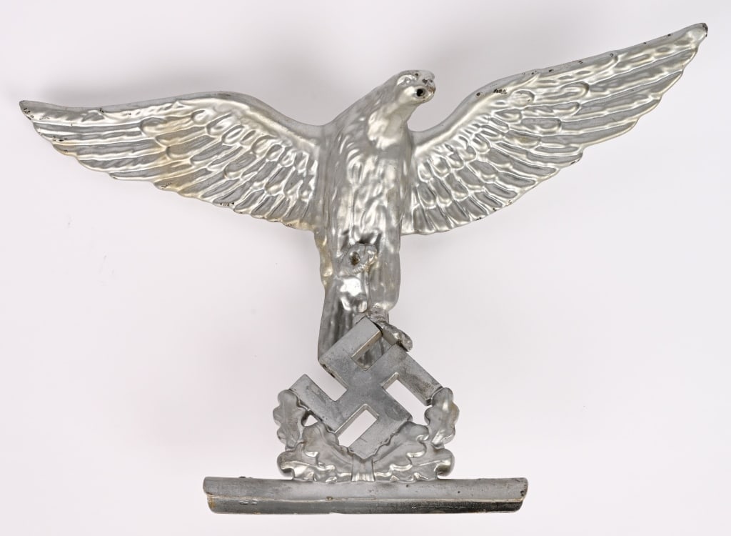 WWII NAZI GERMAN LUFTWAFFE GLOCKENSPIEL EAGLE WW2: This striking Luftwaffe eagle once crowned a ceremonial carillon (Glockenspiel) used by the German Air Force during the Third Reich. Cast in three dimensions with detailed wings, and a mobile swastika
