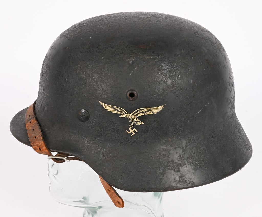 WWII NAZI GERMAN LUFTWAFFE M35 DD HELMET ET64 WW2: Helmet retains most of its original rough textured overpaint camo, Luftwaffe blue/gray paint. Second pattern Luftwaffe eagle decal is retained about 99%. National tri-color shield decal is retained ab
