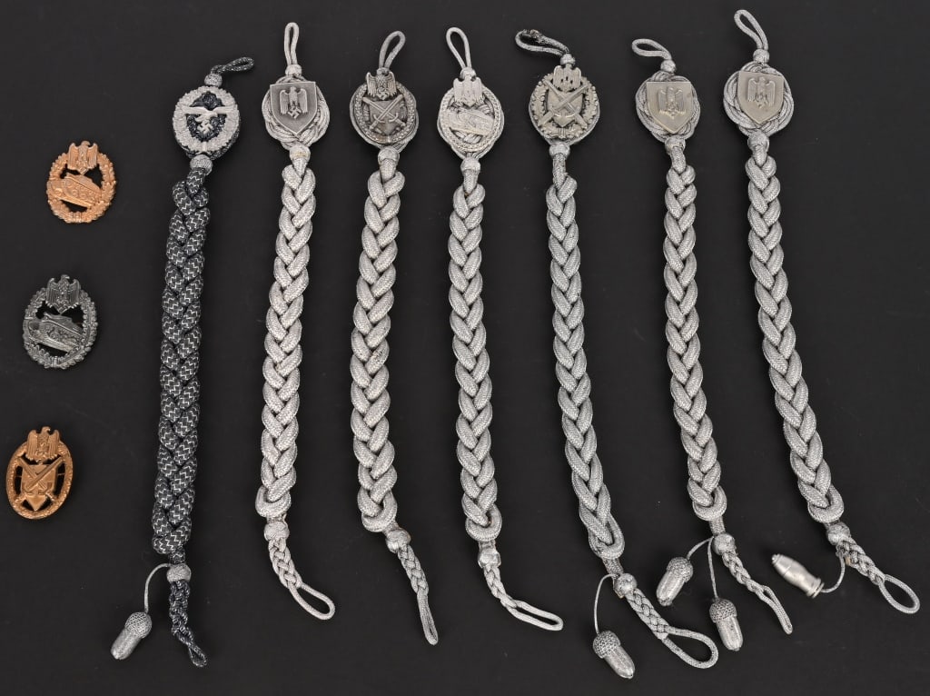 WWII NAZI GERMAN MARKSMANSHIP LANYARD LOT PANZER: Lot of Nazi German Marksmanship Lanyards to include 1) GRADE "ONE" MARKSMAN'S LANYARD. First pattern, (circa June 1936-January 1939), grade one marksmen’s lanyard consists of a roughl