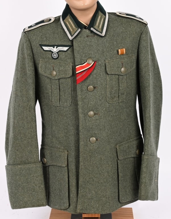 WWII NAZI GERMAN FELDWEBEL M36 INFANTRY TUNIC WW2: Heer M36 style service tunic for a Feldwebel of the Infantry made of very high quality of early war issue field grey wool, dark green collar, brass hook and eye at the throat, five button f