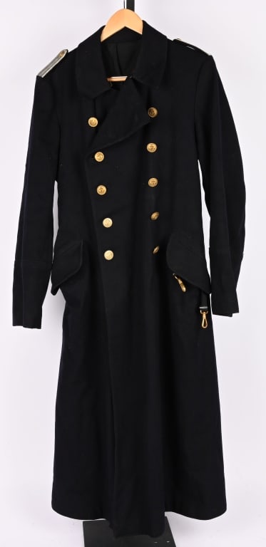 WWII NAZI GERMAN KRIEGSMARINE OFFICER OVERCOAT WW2: Navy blue wool construction, double breasted style, full length greatcoat, with fold back lapels and lay down collar. Coat features dual, vertical, parallel, rows of six front closure buttons with cor